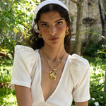 Handmade gold butterfly pendant necklace with Glass Peridot and Labradorite detail — Mountain & Moon Chateau Soleil jewellery