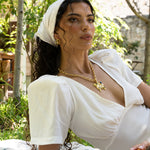 Gold ridged huggie hoop earrings featuring Green CZ, the Alba style — Mountain & Moon Chateau Soleil