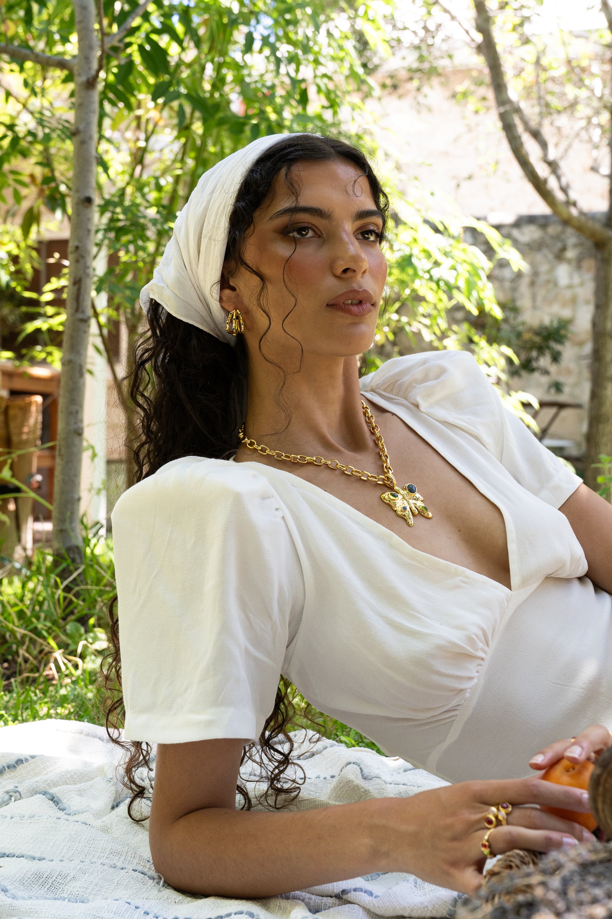 Gold ridged huggie hoop earrings featuring Green CZ, the Alba style — Mountain & Moon Chateau Soleil