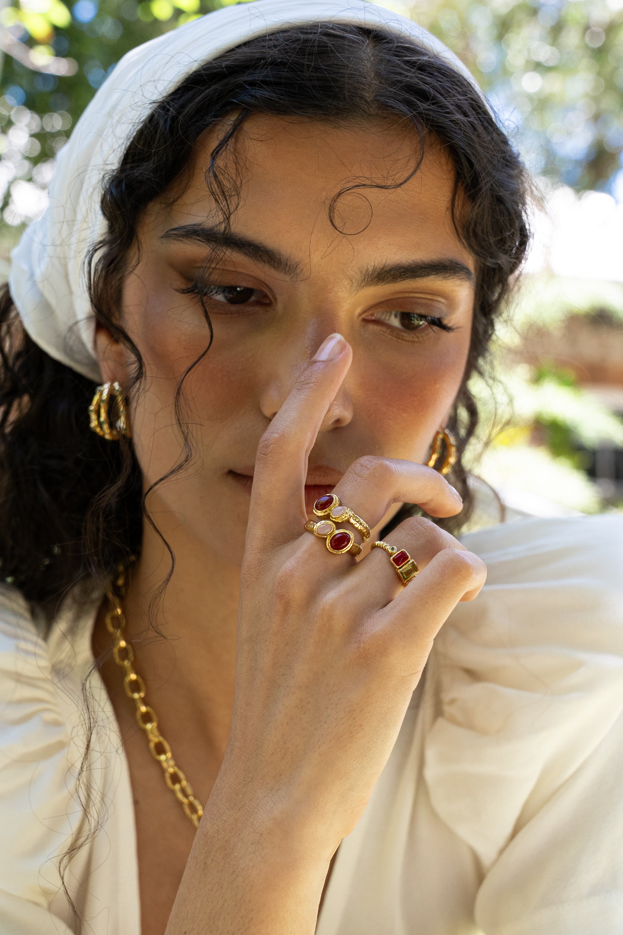Iris gold cocktail ring with Ruby Quartz and Pink Chalcedony worn by model — Mountain & Moon Chateau Soleil collection