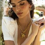 Gold butterfly pendant necklace featuring Glass Peridot and Labradorite, the Rue style — Mountain & Moon Chateau Soleil