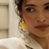 Salma gold sculptural teardrop stud earrings worn by model — Mountain & Moon Chateau Soleil collection
