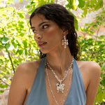 Rue silver butterfly pendant necklace with Rainbow Moonstone and Labradorite worn by model — Mountain & Moon Chateau Soleil collection