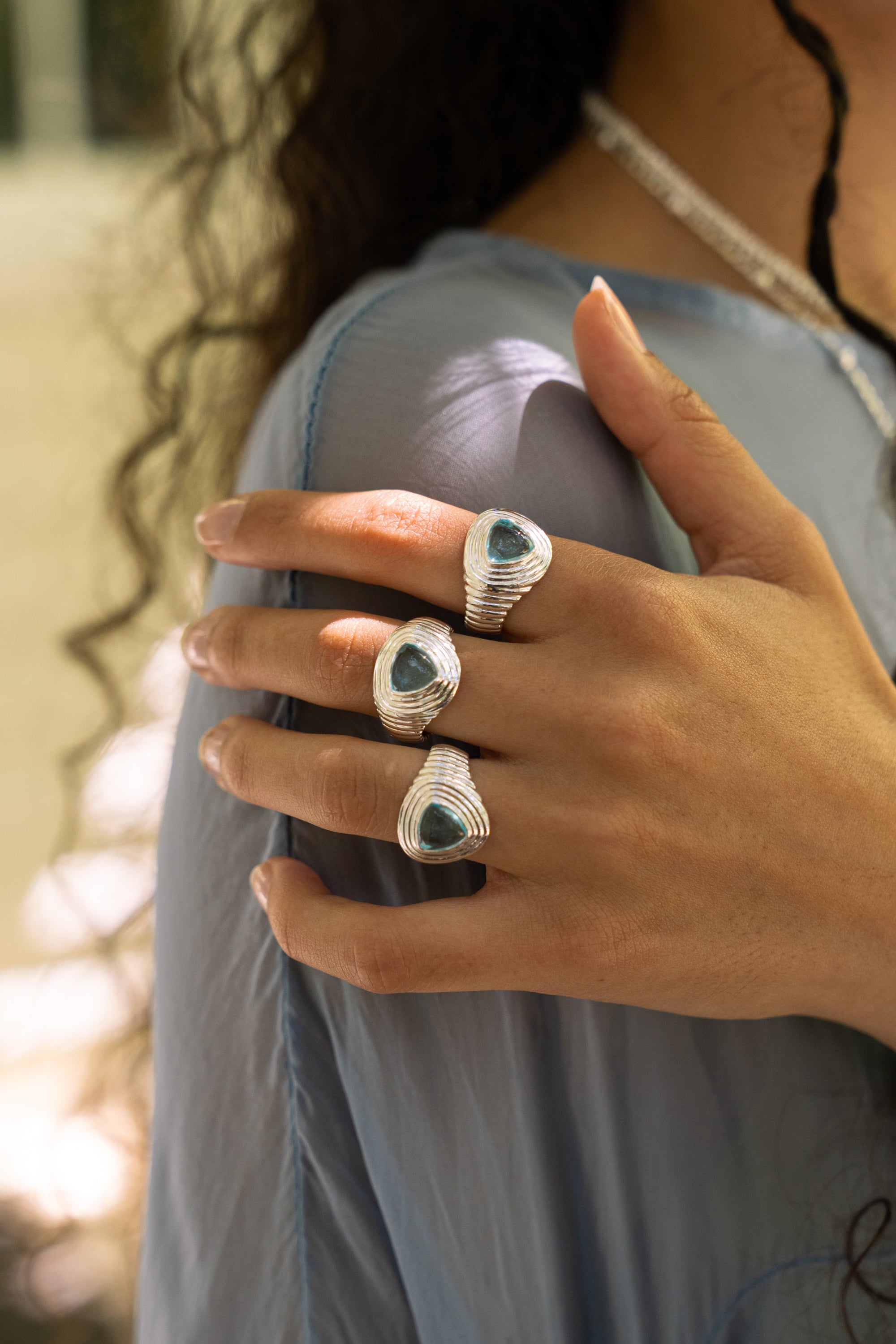 Soraya silver cabochon cocktail ring with Blue Topaz worn by model — Mountain & Moon Chateau Soleil collection