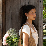 Artemis hammered huggie hoop earrings styled on model, Dalmatian Jasper in silver — Mountain & Moon jewellery