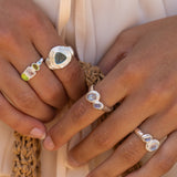 Iris silver cocktail ring with Rainbow Moonstone and Labradorite worn by model — Mountain & Moon Chateau Soleil collection