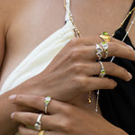 Lumi stacking ring styled on model, Rainbow Moonstone and Glass Peridot in silver — Mountain & Moon jewellery
