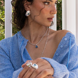 Glass Blue Topaz and Freshwater Pearl silver hammered oval stud earrings from the Chateau Soleil collection by Mountain & Moon — Darcy