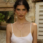 Liberty gold long dangle earrings with Rainbow Moonstone and Glass Pearl worn by model — Mountain & Moon Chateau Soleil collection