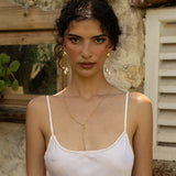 Liberty gold long dangle earrings with Rainbow Moonstone and Glass Pearl worn by model — Mountain & Moon Chateau Soleil collection