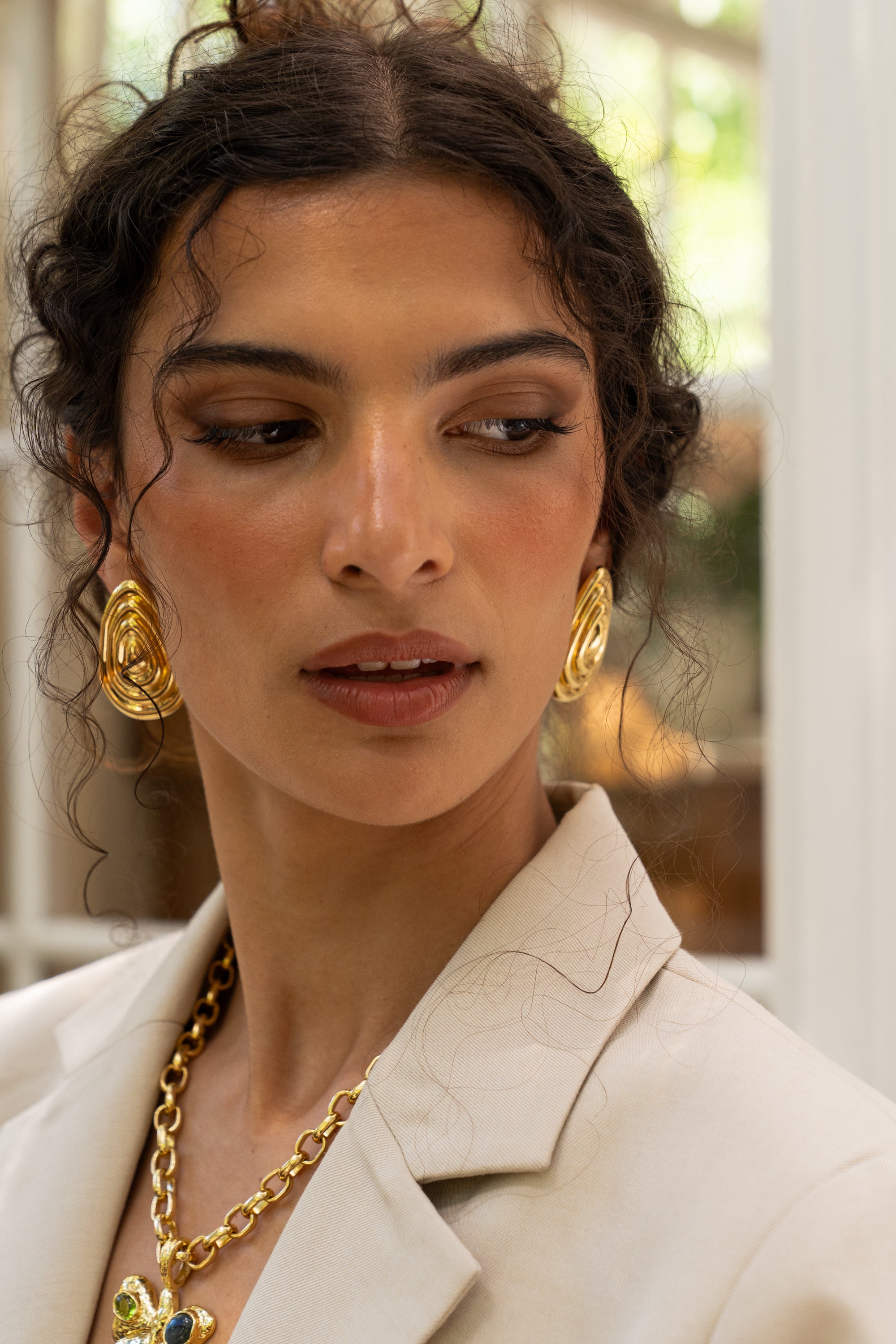 Gold sculptural teardrop stud earrings from the Chateau Soleil collection by Mountain & Moon — Salma