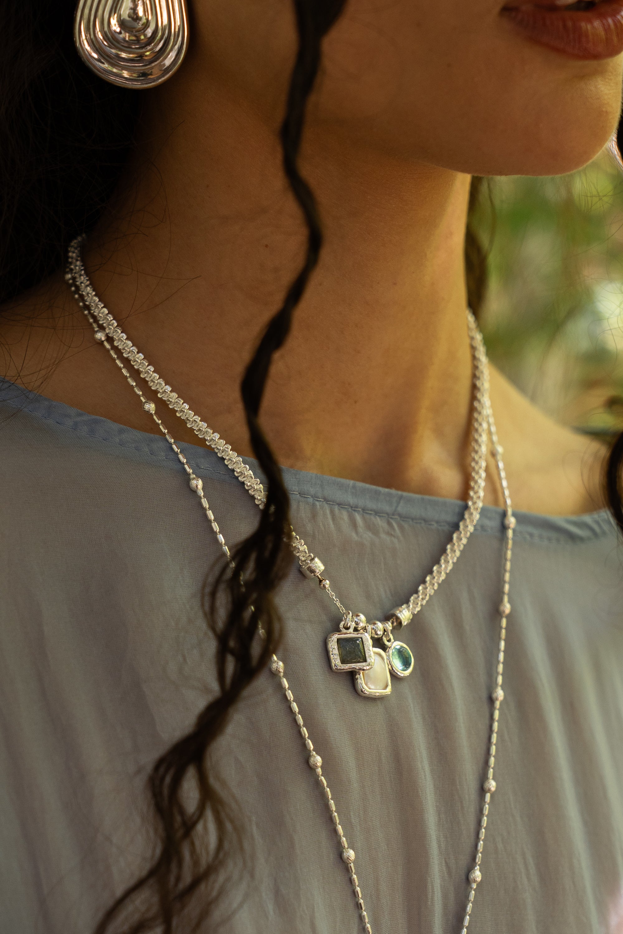 Silver charm necklace featuring Glass Sky Blue Topaz, Labradorite and Freshwater Pearl, the Aura style — Mountain & Moon Chateau Soleil