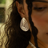 Salma silver sculptural teardrop stud earrings worn by model — Mountain & Moon Chateau Soleil collection