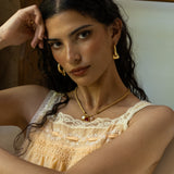 Tigers Eye gold hammered huggie hoop earrings from the Chateau Soleil collection by Mountain & Moon — Artemis