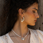 Handmade silver charm necklace with Glass Sky Blue Topaz, Labradorite and Freshwater Pearl detail — Mountain & Moon Chateau Soleil jewellery