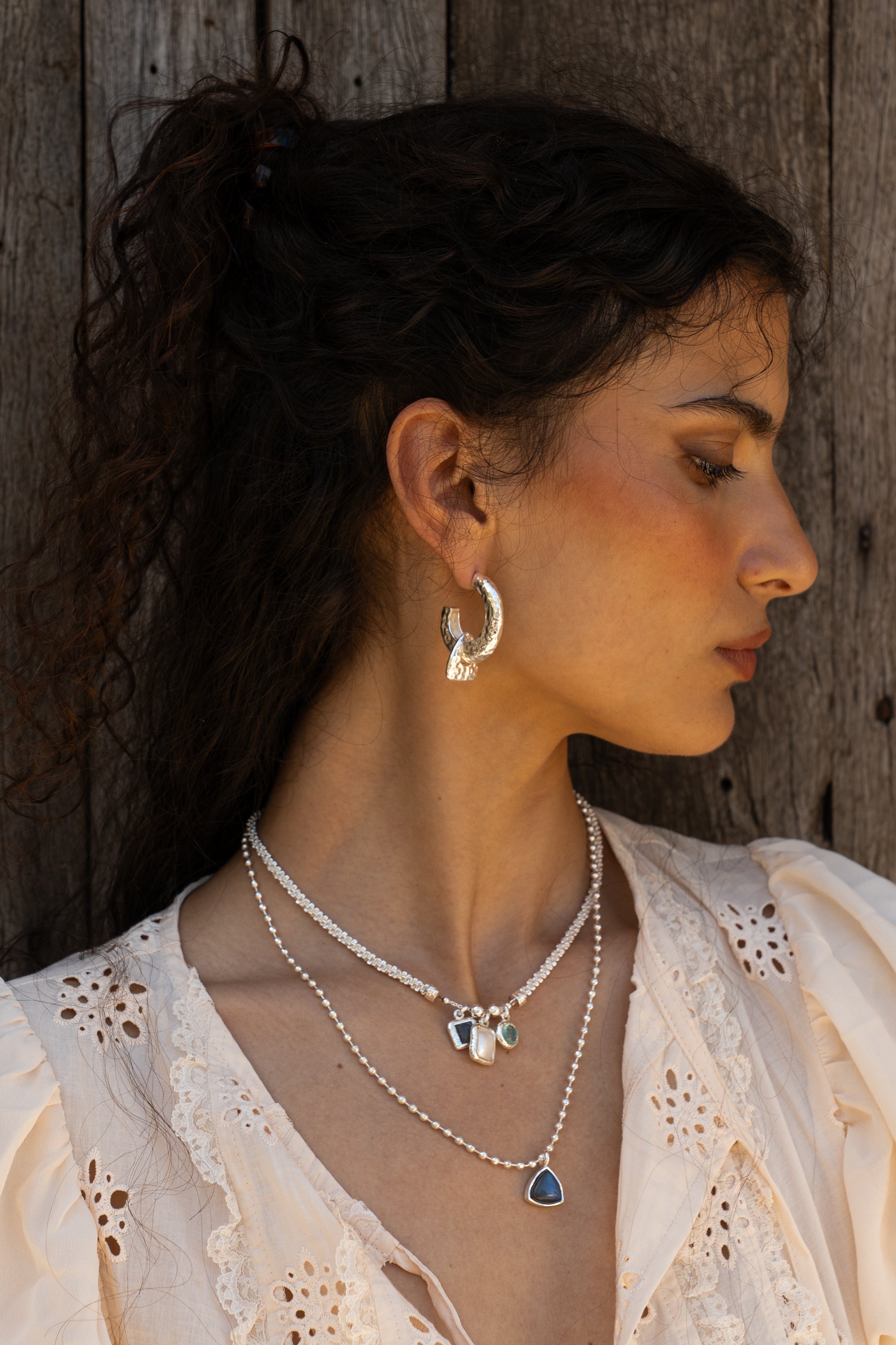 Handmade silver charm necklace with Glass Sky Blue Topaz, Labradorite and Freshwater Pearl detail — Mountain & Moon Chateau Soleil jewellery