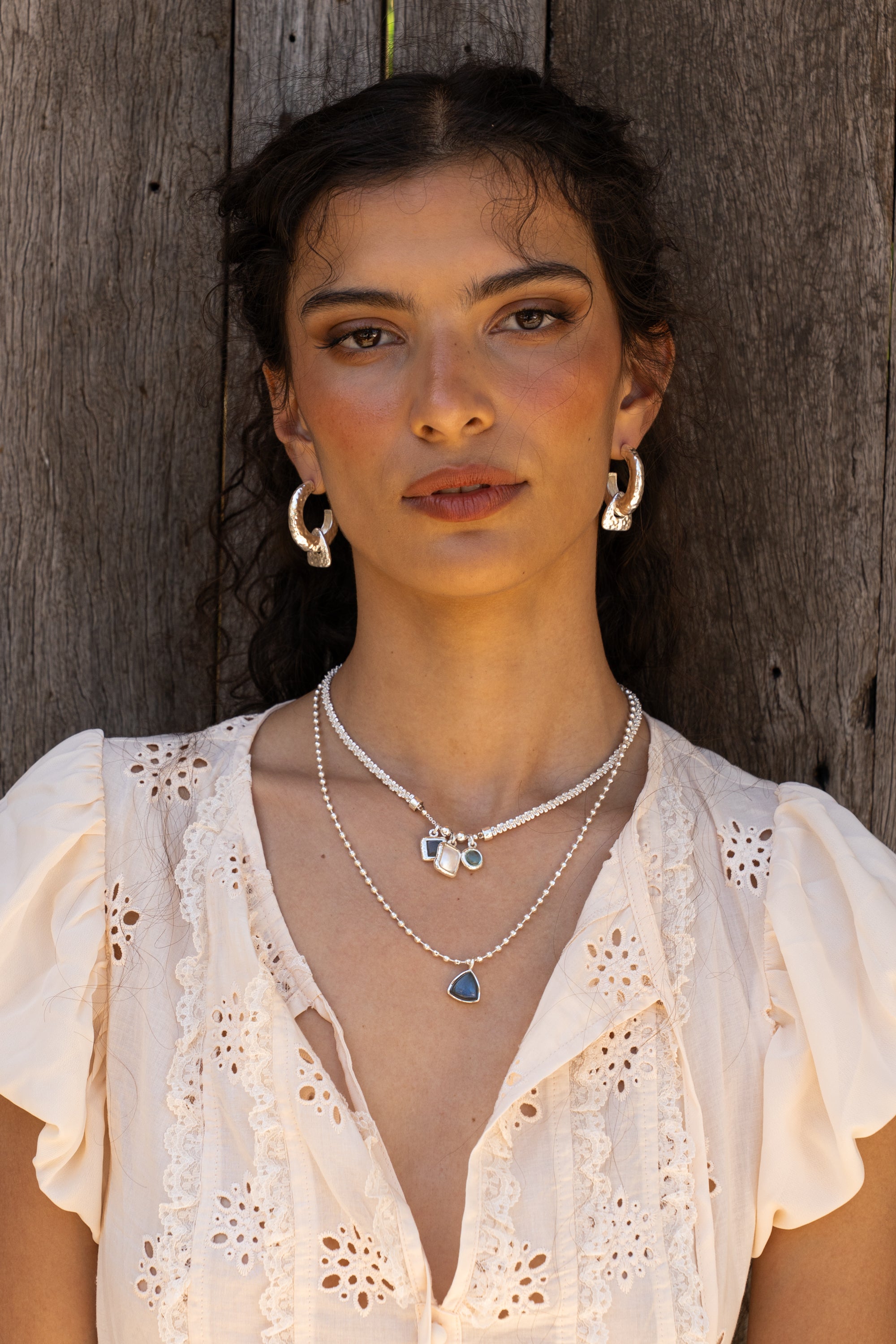 Glass Sky Blue Topaz, Labradorite and Freshwater Pearl silver charm necklace from the Chateau Soleil collection by Mountain & Moon — Aura