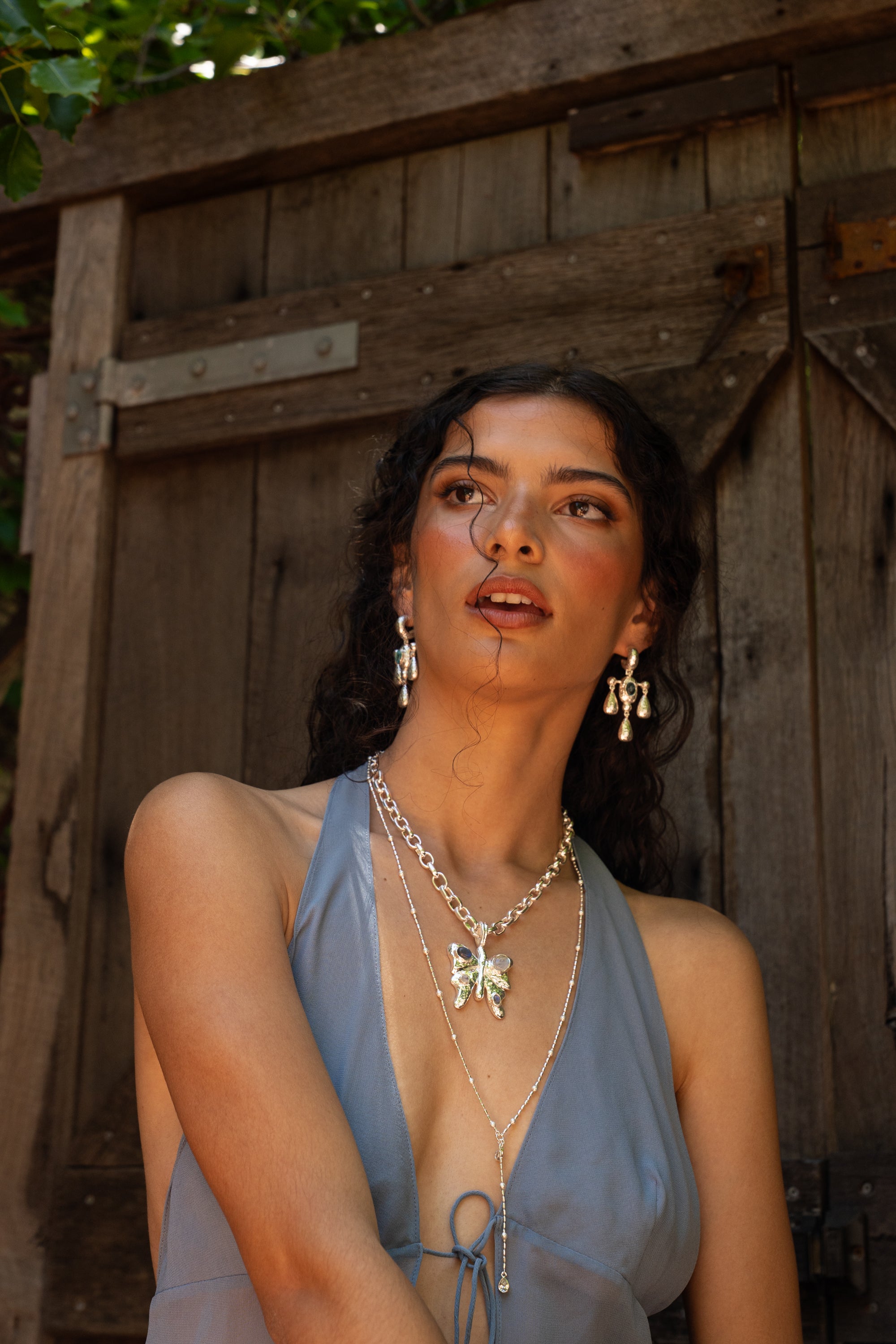 Handmade silver butterfly pendant necklace with Rainbow Moonstone and Labradorite detail — Mountain & Moon Chateau Soleil jewellery