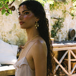 Fleur chandelier drop earrings styled on model, Crystal Quartz in gold — Mountain & Moon jewellery
